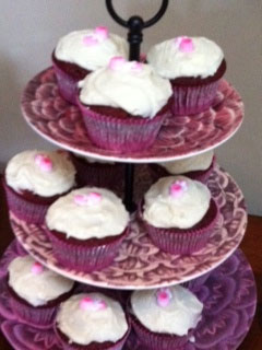 cupcake stand with frosted cupcakes